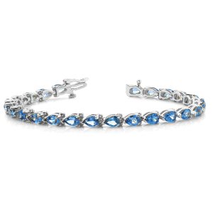 Vega Blue Topaz Silver 3 Prong Set Diamond Tennis